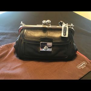 COACH black leather clutch handbag
